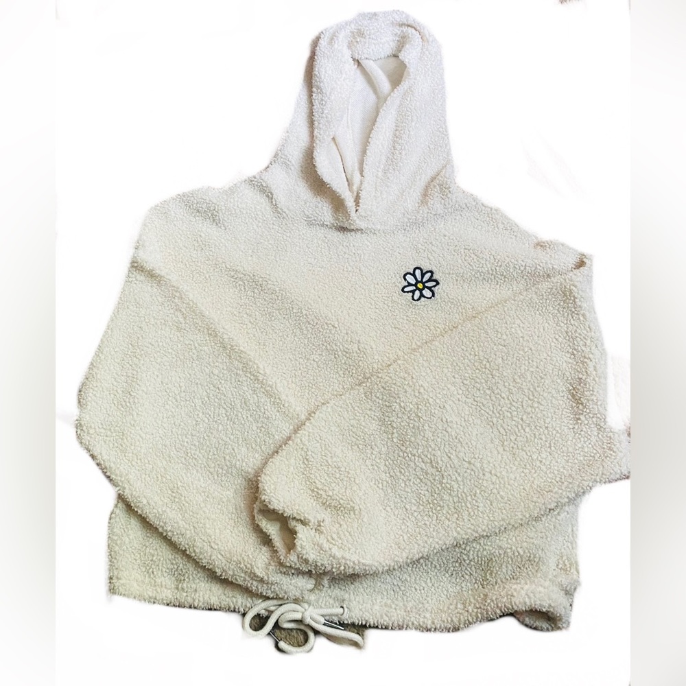 A crop hoodie in juniors it’s good quality and very soft and a warm white color